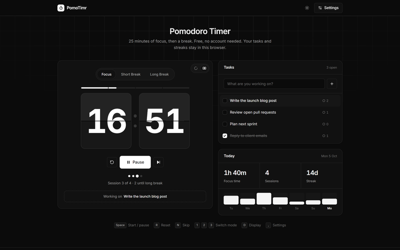 PomoTimr in dark mode with the flip clock display counting down a focus session